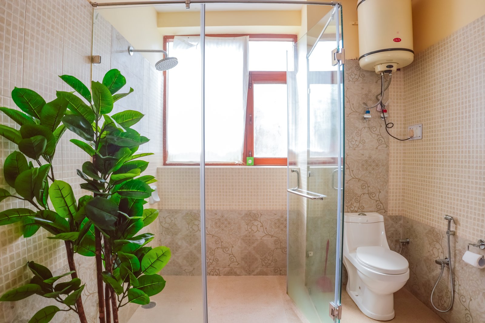 Clean and modern attached bathroom with hot water shower, western toilet, and premium fittings at Forestbound Cottage